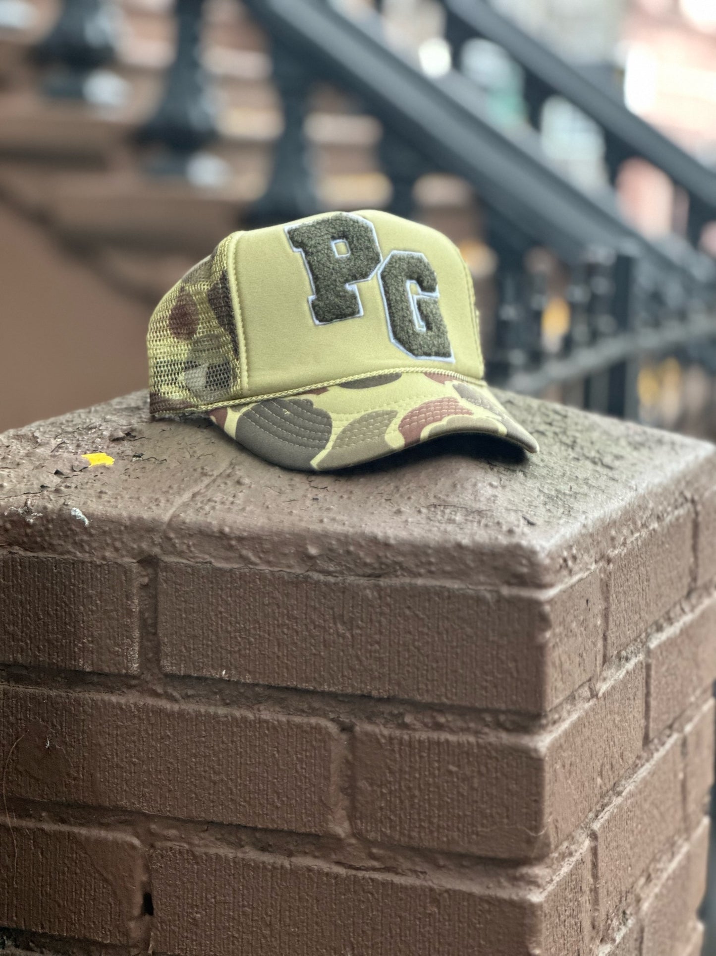 PG Collegiate Camo Trucker