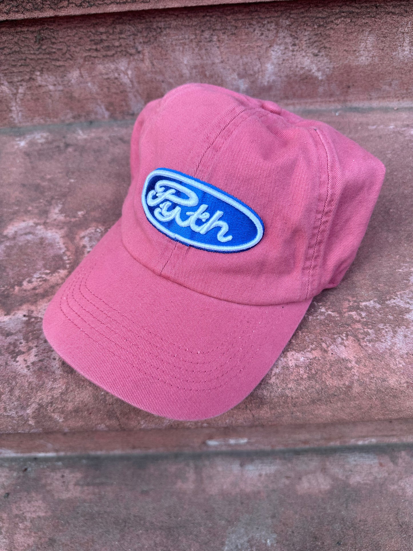 Burt Red '' Pyth" Logo cap by Pythagore's Goods